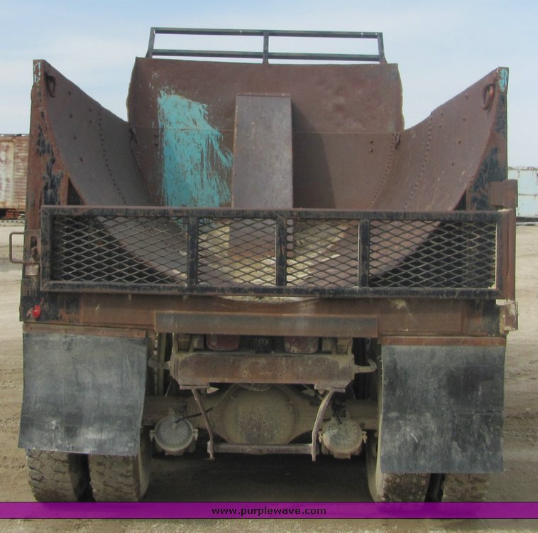 image for item 3095 1979 GMC Brigadier tandem axle barrel bed dump truck