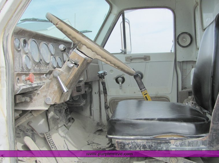 image for item 3095 1979 GMC Brigadier tandem axle barrel bed dump truck