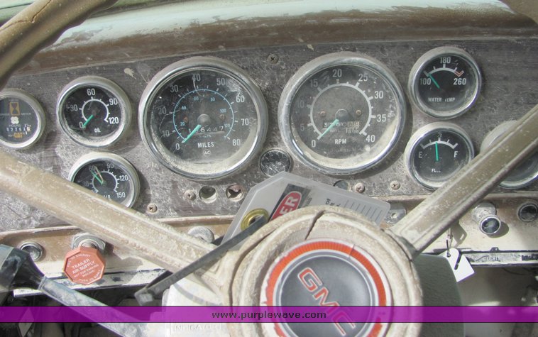 image for item 3095 1979 GMC Brigadier tandem axle barrel bed dump truck