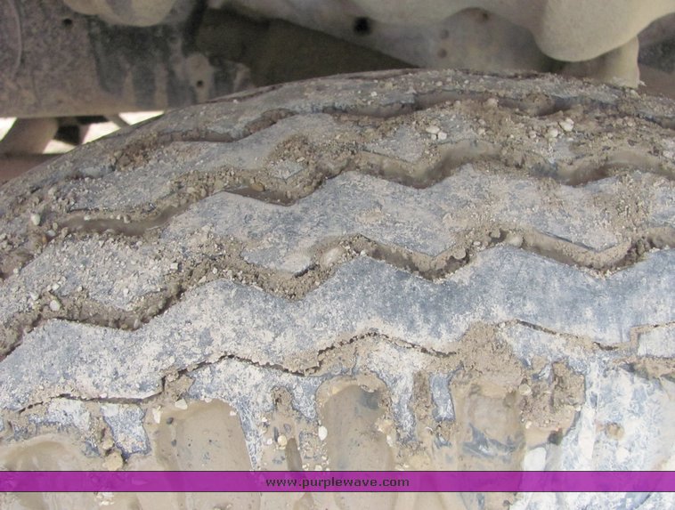 image for item 3095 1979 GMC Brigadier tandem axle barrel bed dump truck
