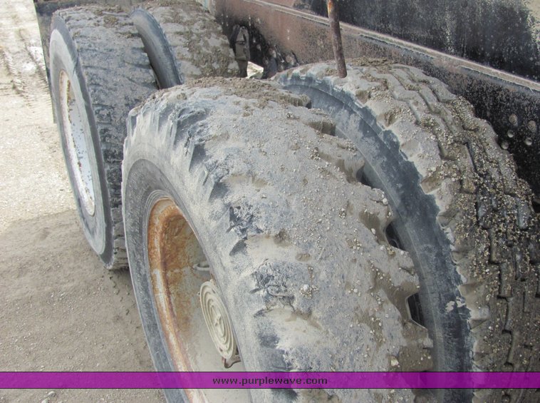 image for item 3095 1979 GMC Brigadier tandem axle barrel bed dump truck