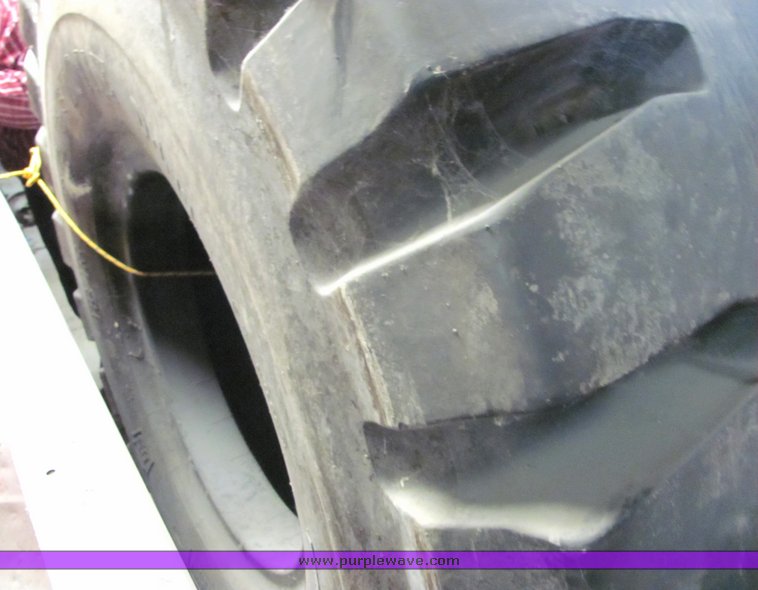 image for item 3136 Bridge Stone D-lug 29.5x29 tire