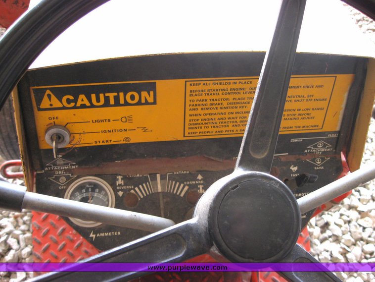 image for item 3416 Case 446 garden tractor with seven attachments