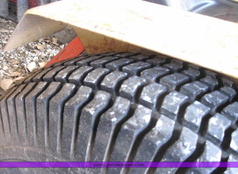 image for item 3416 Case 446 garden tractor with seven attachments