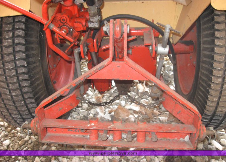 image for item 3416 Case 446 garden tractor with seven attachments