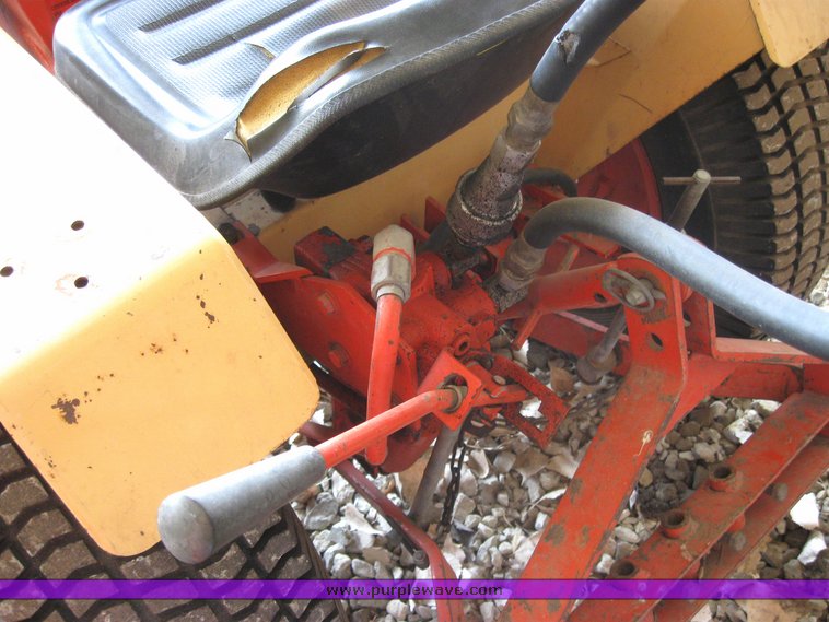 image for item 3416 Case 446 garden tractor with seven attachments