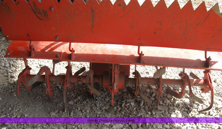 image for item 3416 Case 446 garden tractor with seven attachments