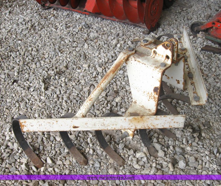 image for item 3416 Case 446 garden tractor with seven attachments