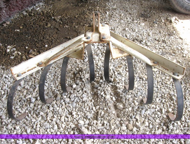 image for item 3416 Case 446 garden tractor with seven attachments