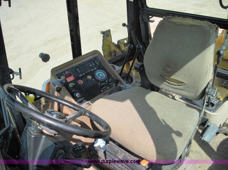 image for item 4703 1993 John Deere 310D backhoe