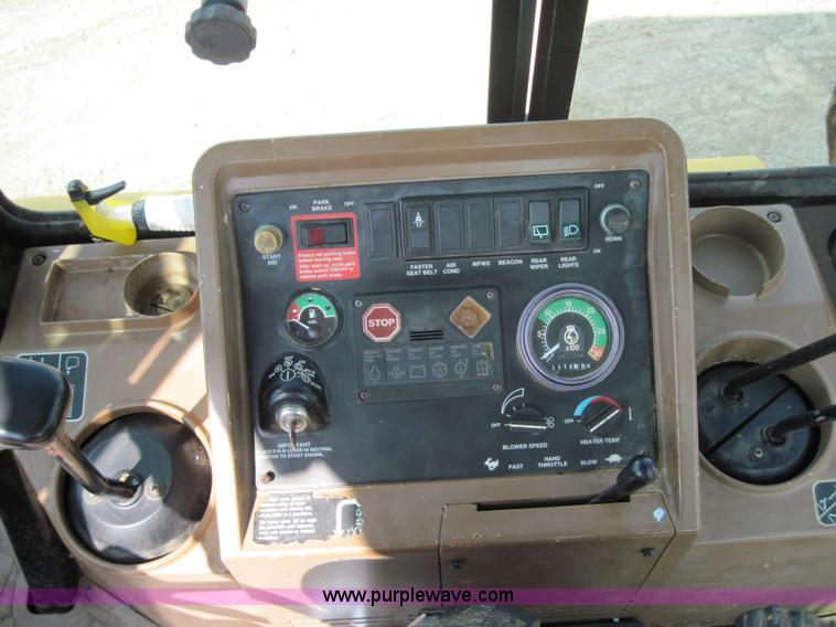 image for item 4703 1993 John Deere 310D backhoe