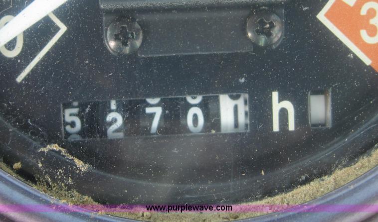 image for item 4703 1993 John Deere 310D backhoe