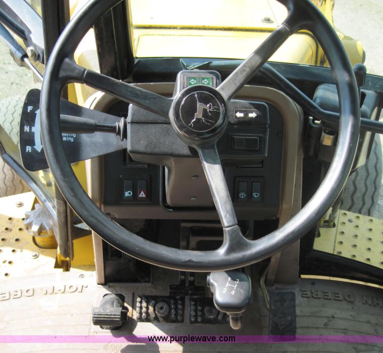 image for item 4703 1993 John Deere 310D backhoe