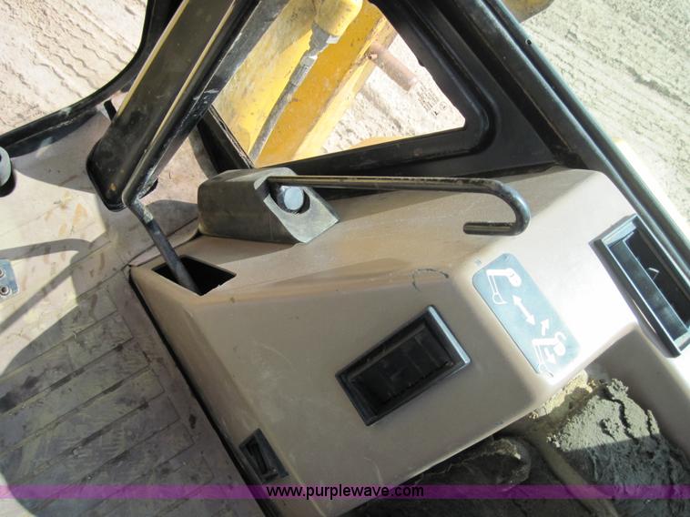 image for item 4703 1993 John Deere 310D backhoe