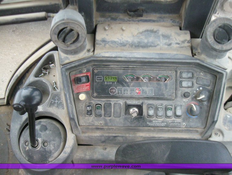 image for item 5728 2003 John Deere 310SG backhoe loader