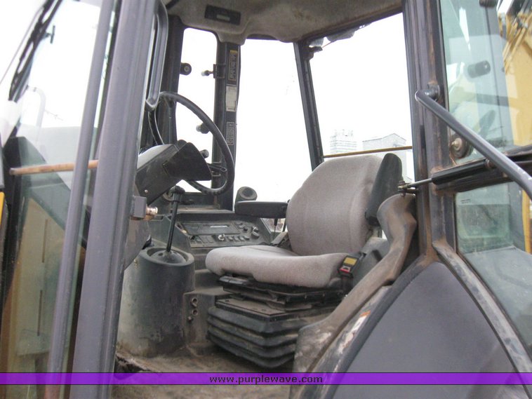 image for item 5728 2003 John Deere 310SG backhoe loader