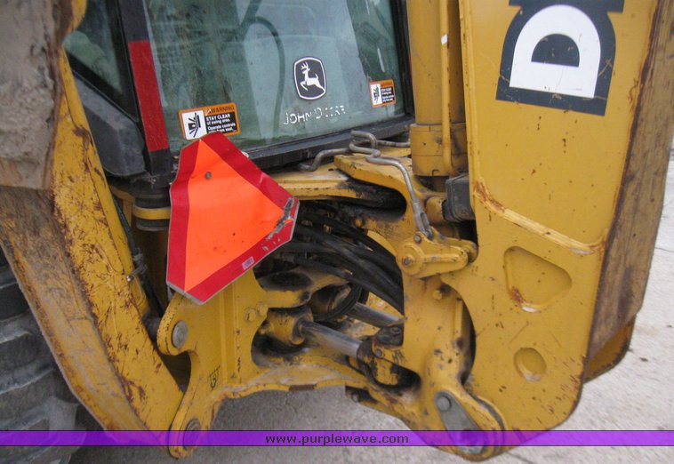image for item 5728 2003 John Deere 310SG backhoe loader