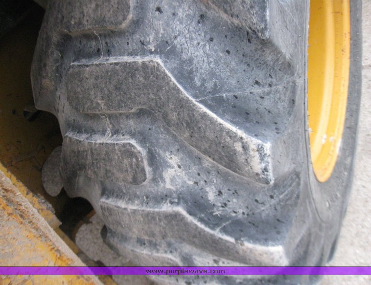 image for item 5728 2003 John Deere 310SG backhoe loader