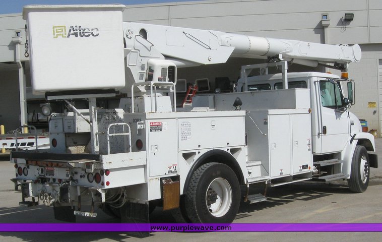 image for item 6052 2000 Freightliner FL70 boom truck