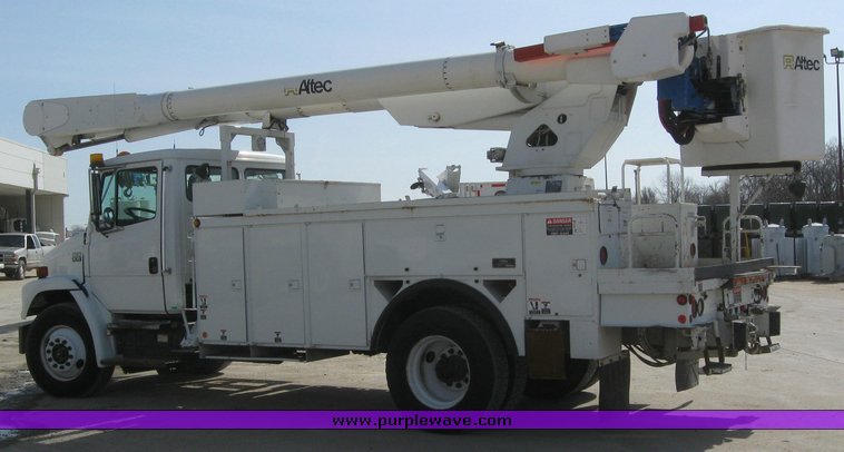 image for item 6052 2000 Freightliner FL70 boom truck