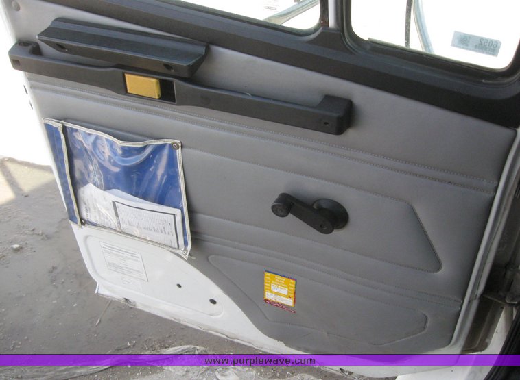 image for item 6052 2000 Freightliner FL70 boom truck