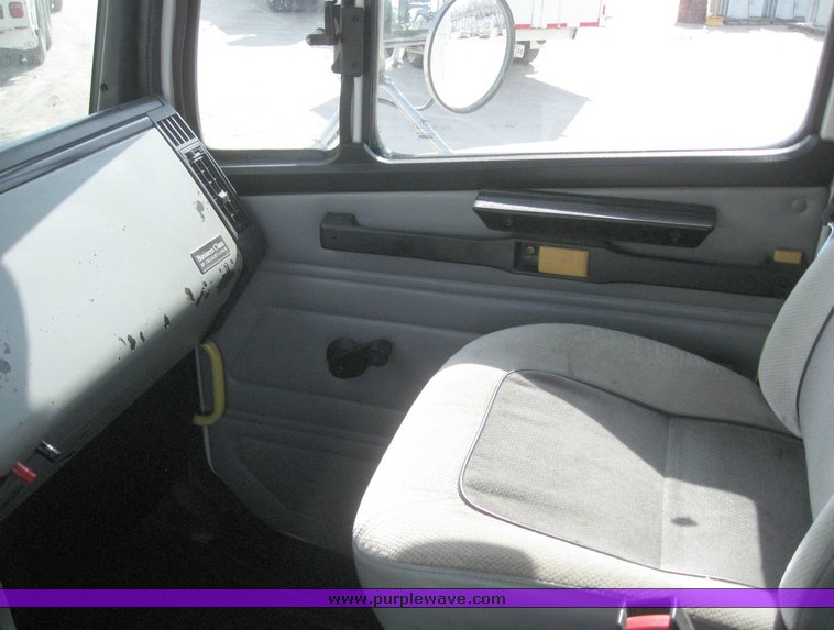 image for item 6052 2000 Freightliner FL70 boom truck