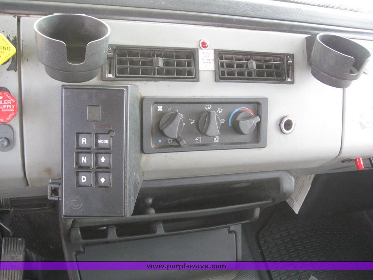 image for item 6052 2000 Freightliner FL70 boom truck