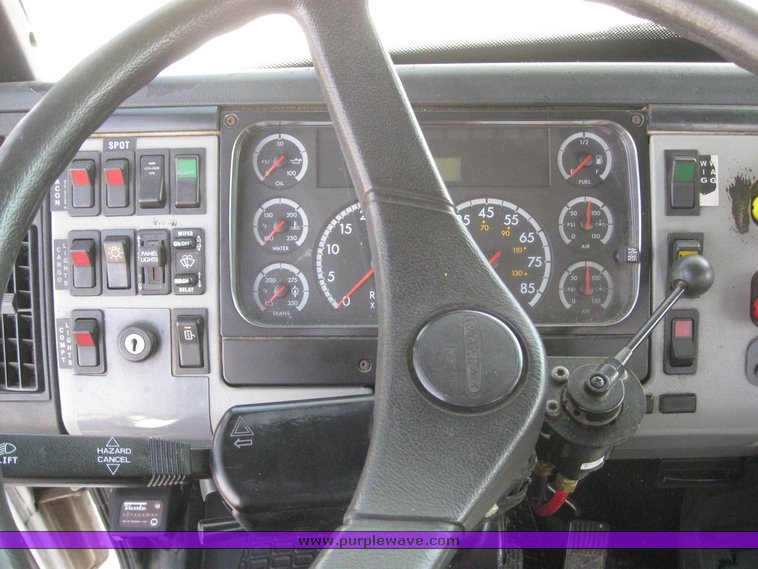 image for item 6052 2000 Freightliner FL70 boom truck