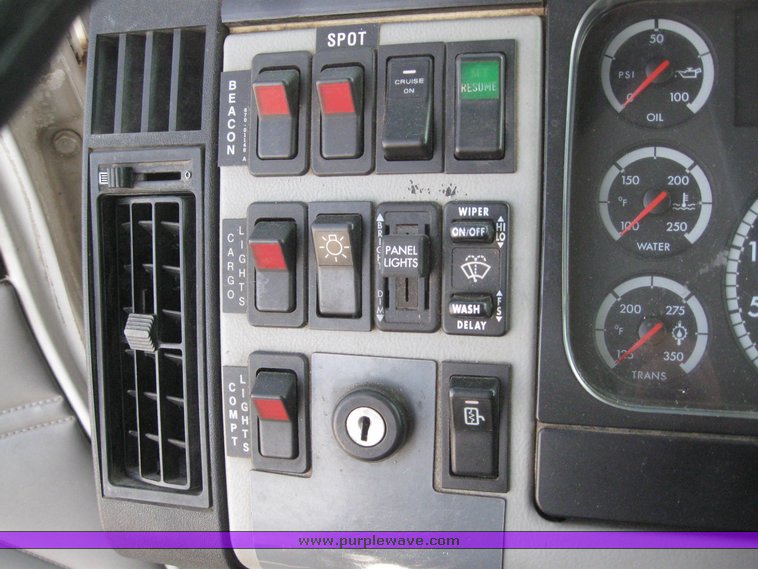 image for item 6052 2000 Freightliner FL70 boom truck