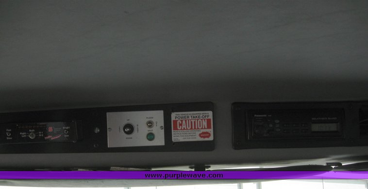 image for item 6052 2000 Freightliner FL70 boom truck