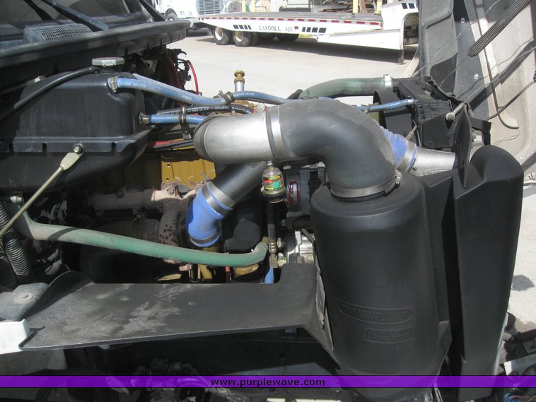 image for item 6052 2000 Freightliner FL70 boom truck