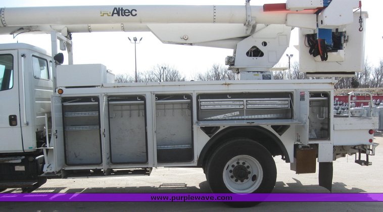 image for item 6052 2000 Freightliner FL70 boom truck