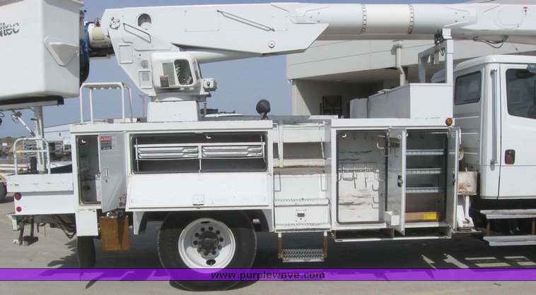 image for item 6052 2000 Freightliner FL70 boom truck