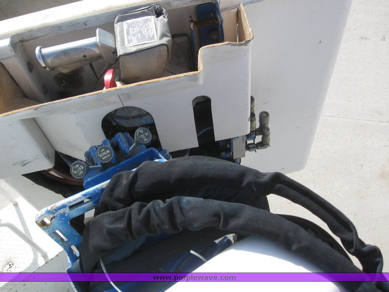 image for item 6052 2000 Freightliner FL70 boom truck