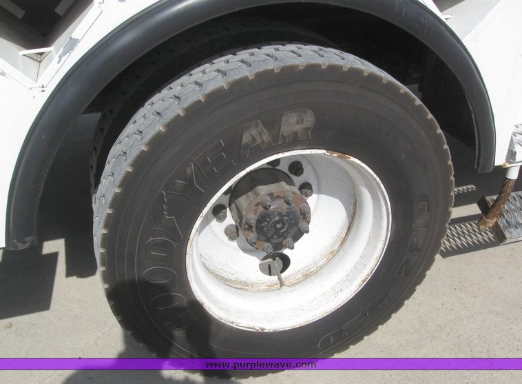 image for item 6052 2000 Freightliner FL70 boom truck