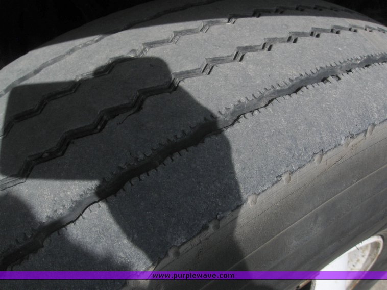 image for item 6052 2000 Freightliner FL70 boom truck