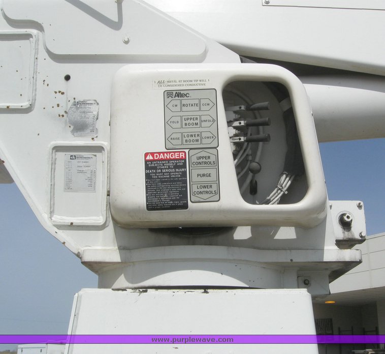 image for item 6052 2000 Freightliner FL70 boom truck