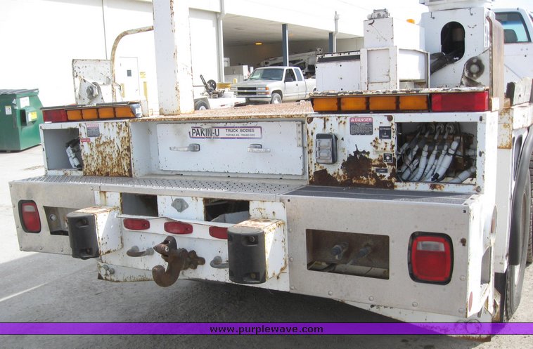 image for item 6053 1997 GMC C8500 boom lift truck