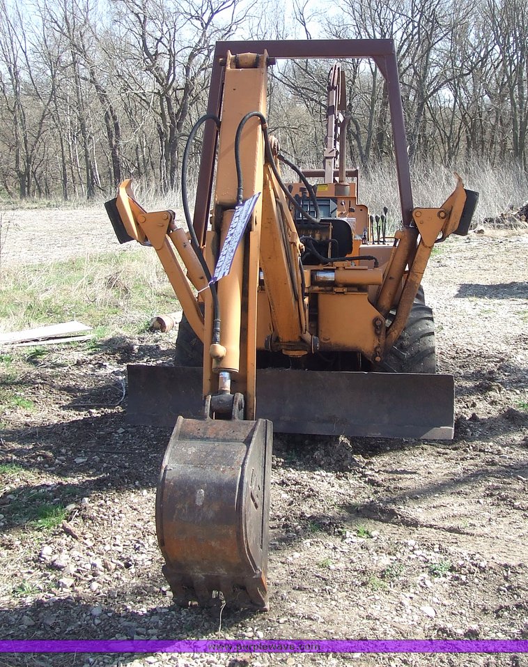 image for item 6712 Case DH4 trencher with backhoe