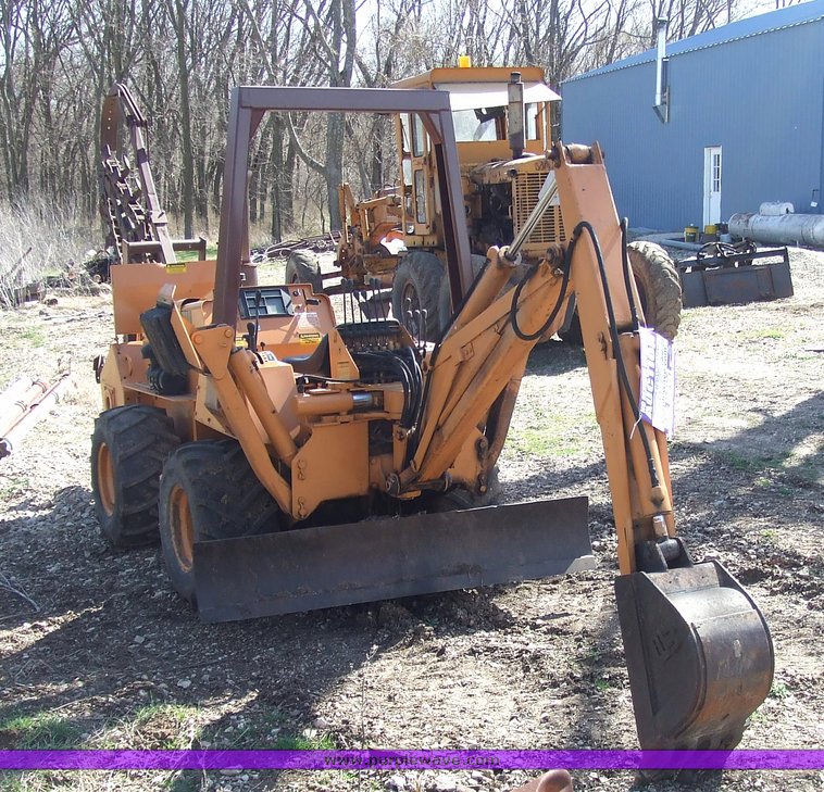 image for item 6712 Case DH4 trencher with backhoe