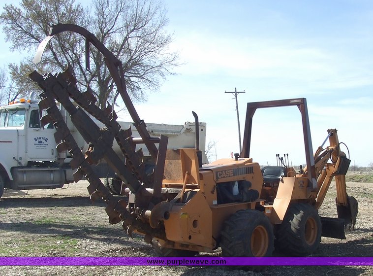 image for item 6712 Case DH4 trencher with backhoe
