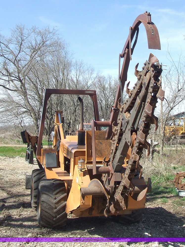 image for item 6712 Case DH4 trencher with backhoe