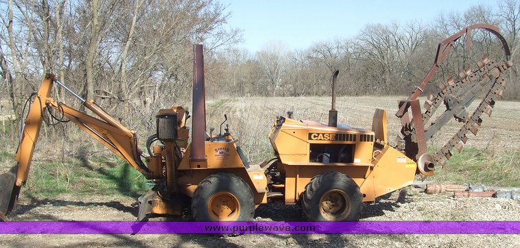 image for item 6712 Case DH4 trencher with backhoe