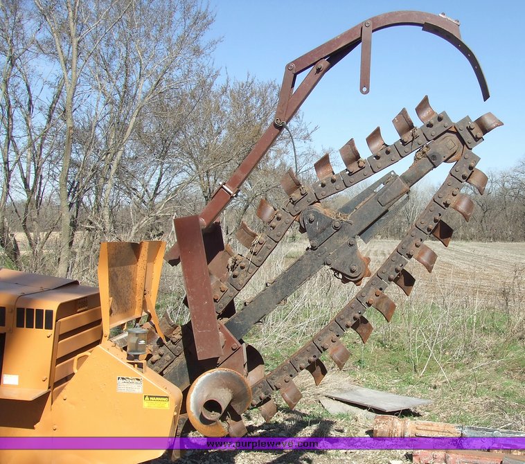 image for item 6712 Case DH4 trencher with backhoe