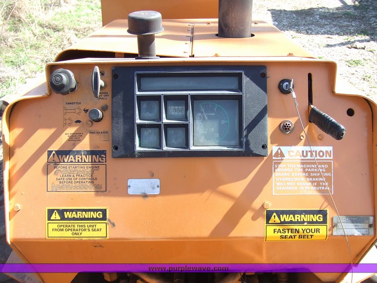 image for item 6712 Case DH4 trencher with backhoe