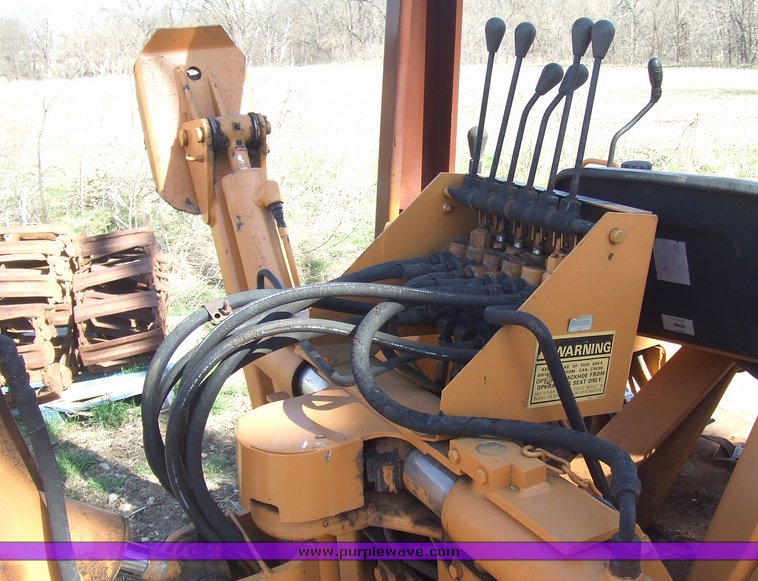 image for item 6712 Case DH4 trencher with backhoe