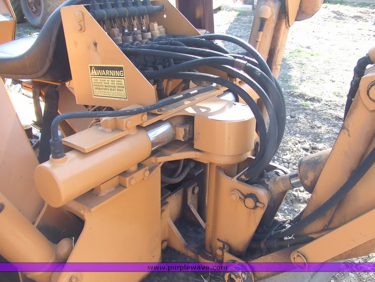 image for item 6712 Case DH4 trencher with backhoe