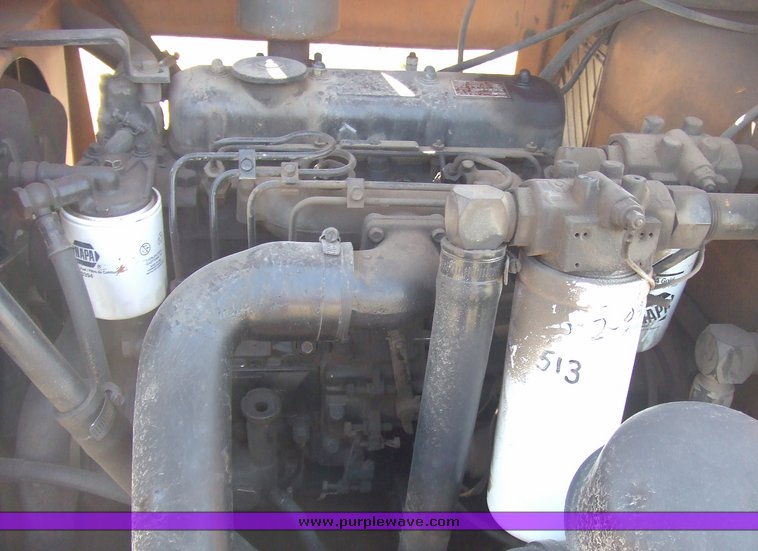 image for item 6712 Case DH4 trencher with backhoe