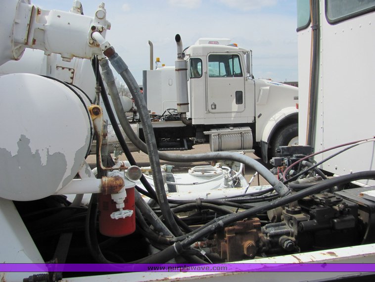 image for item 9043 1994 Kenworth Construct W900 mixer truck