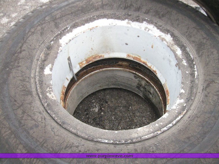 image for item 5606 (3) 10.00-20 tires and wheels